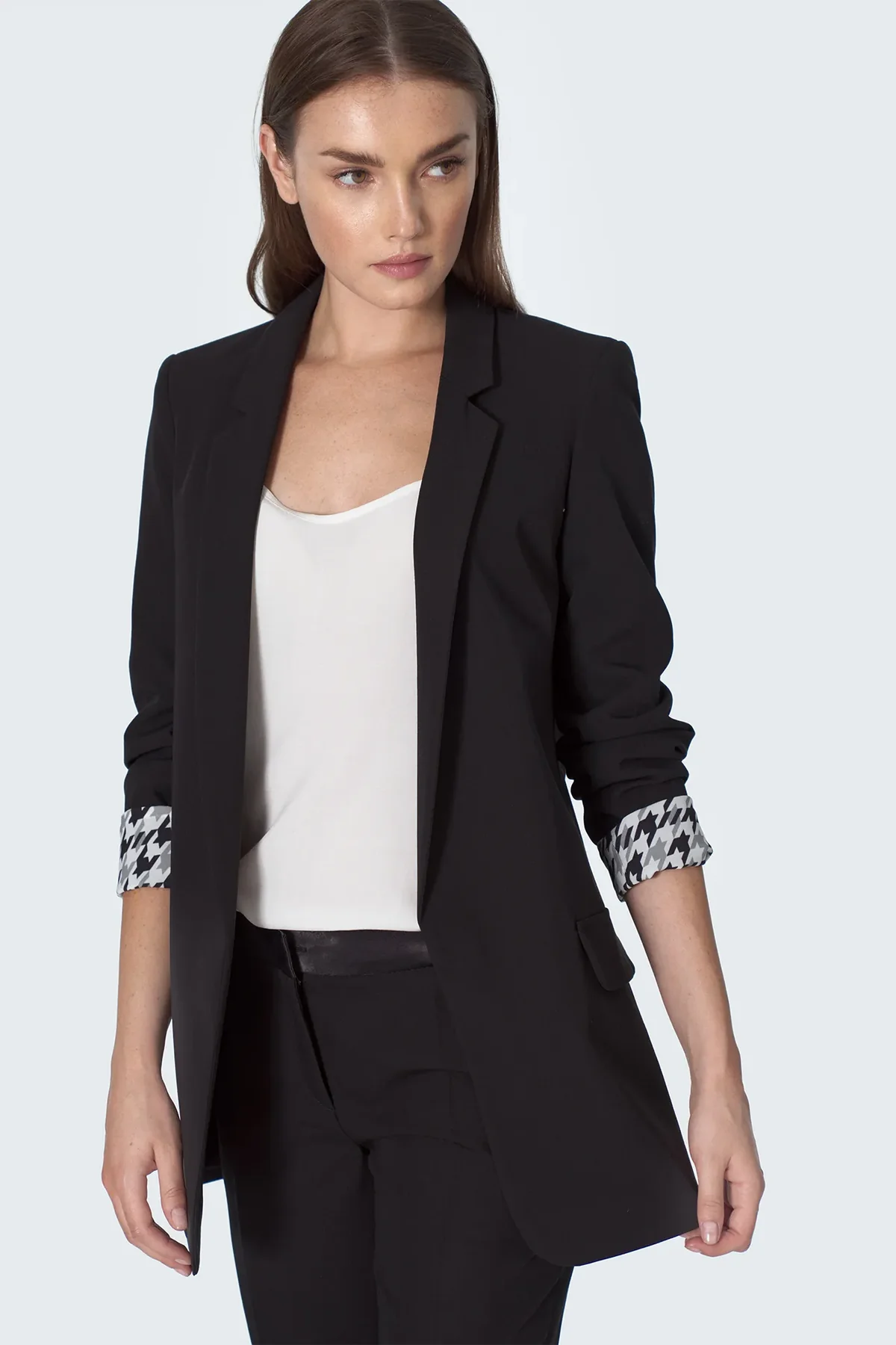 Black blazer with roll-up sleeves